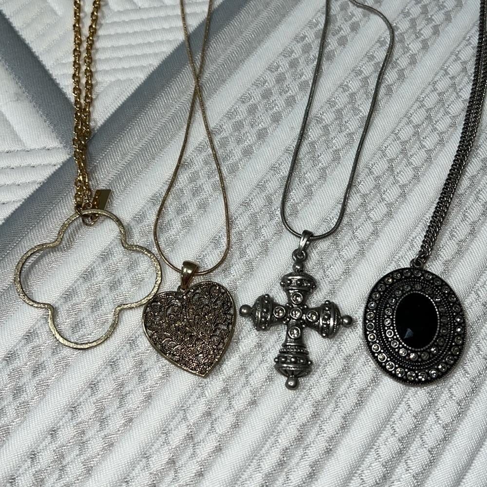 Set of 4 necklaces to gold two silver needs some cleaning worn each maybe once